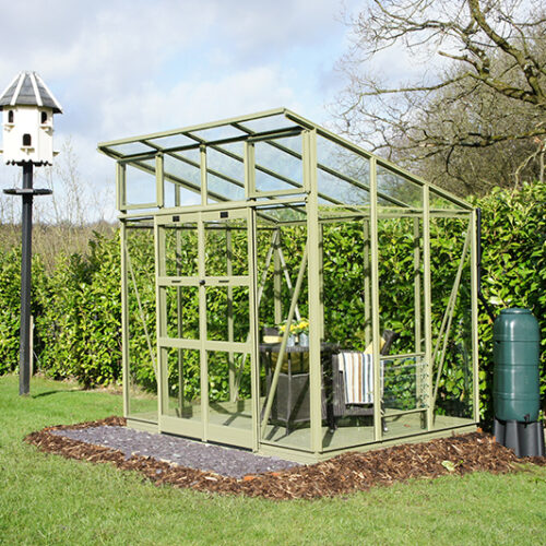 Little glass conservatory with sun light